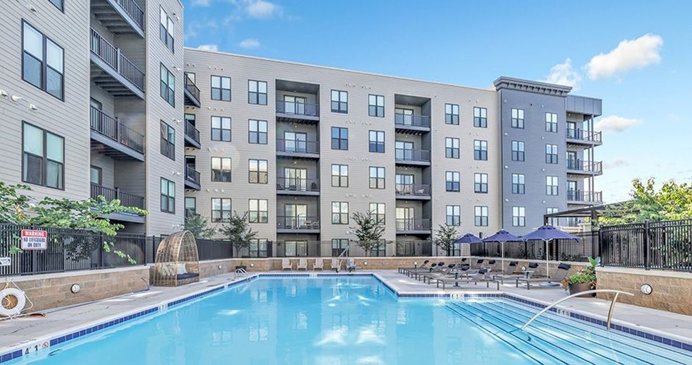 Resort-style pool at completed multifamily development